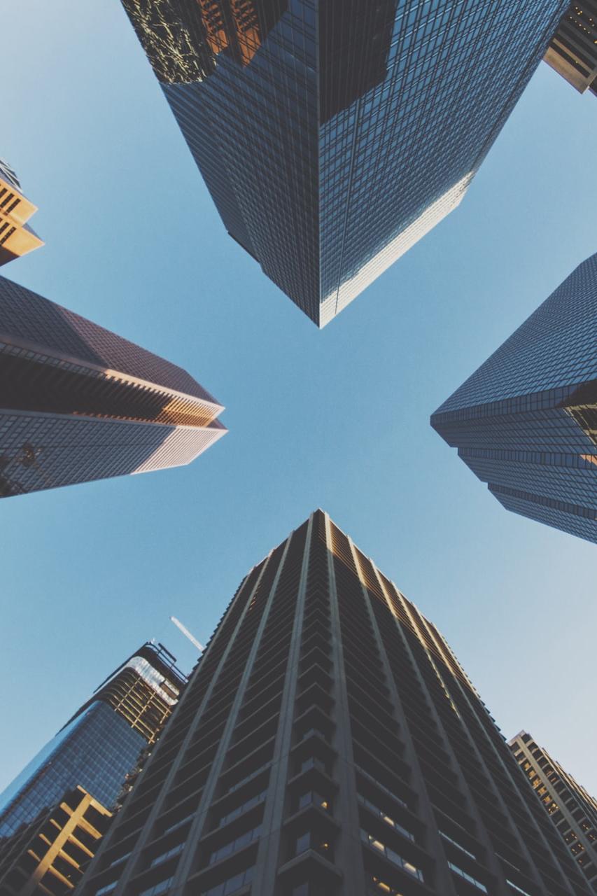 blue and black city buildings photography